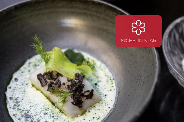 michelin star logo on fish dish