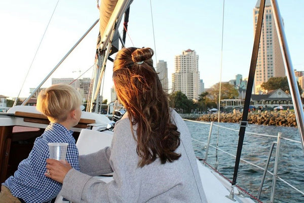 mother and sun on sunset sail