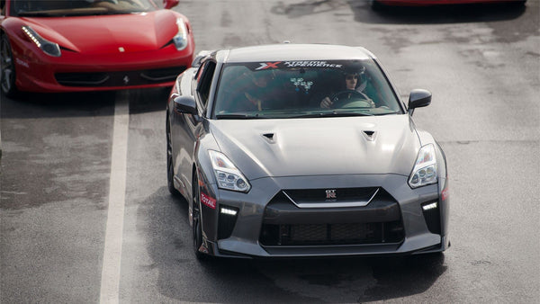 Nissan-GT-silver driving on road