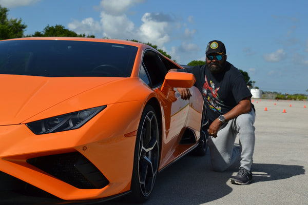 couple and super car