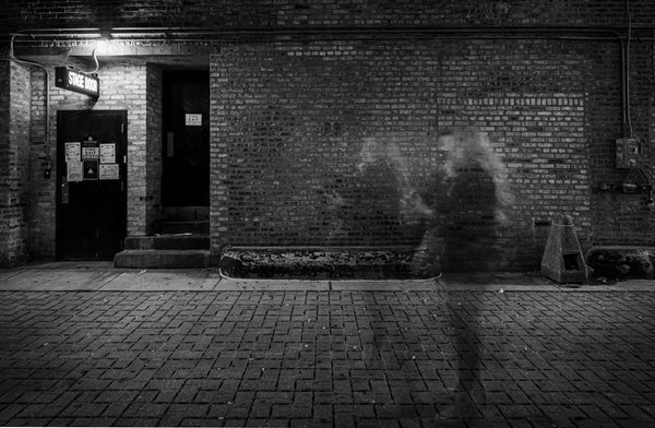 outline of ghosts in street