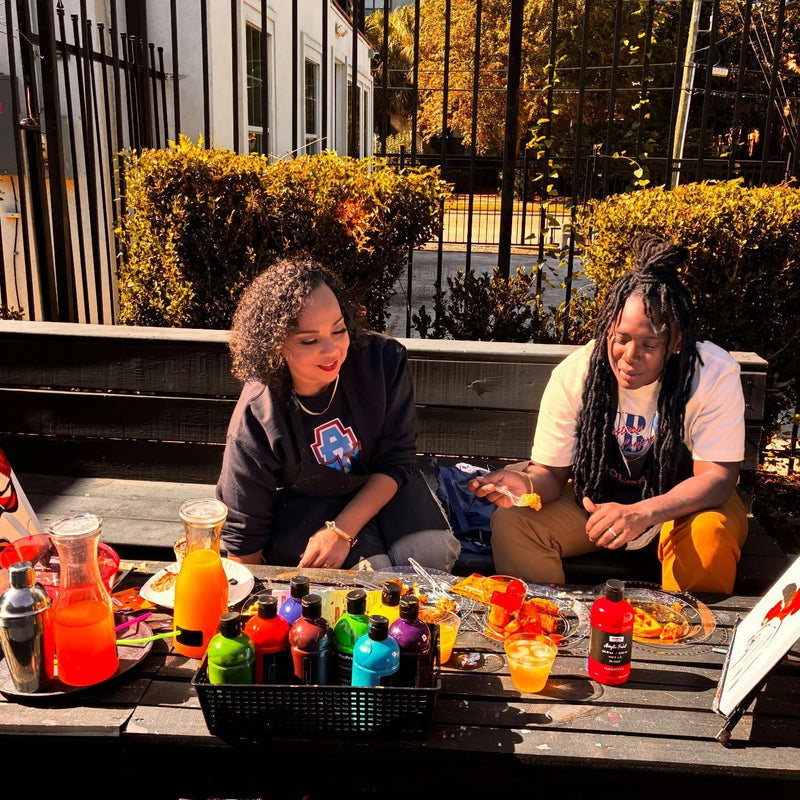 painting outside together in houston