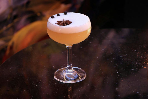 peach cocktail on table
