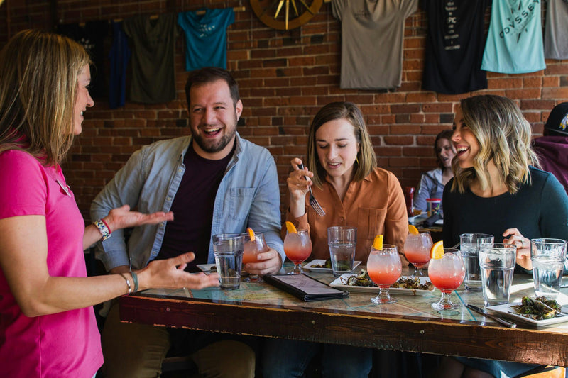 people enjoying drinks and food.jpg