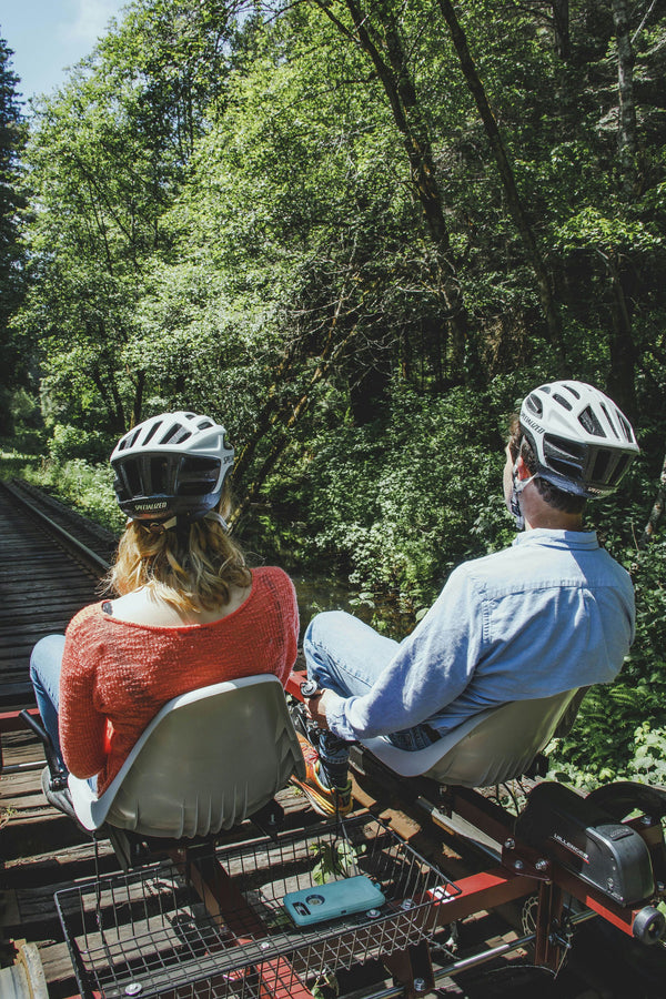 people in railbikes