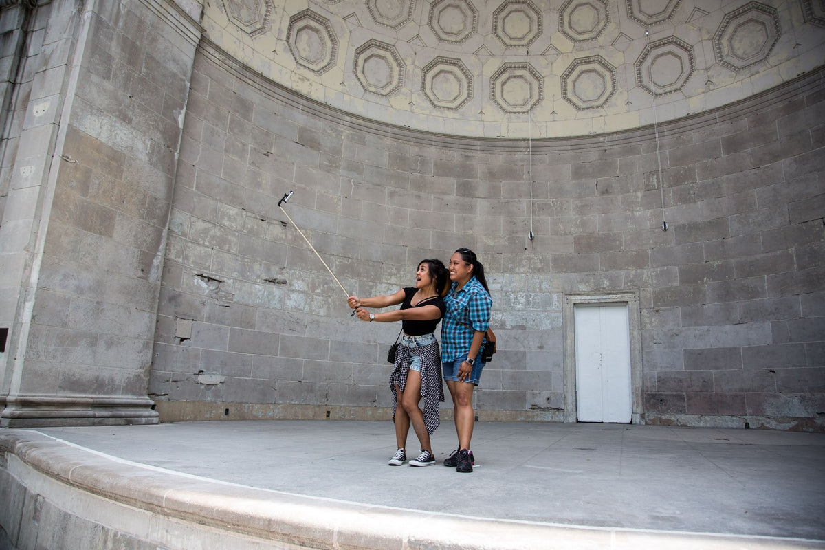 people-taking-selfies-in-cement-area-jpg