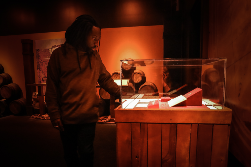 person-looking-at-artifacts