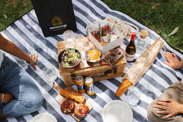 picnic-spread-on-blue-and-white-blanket