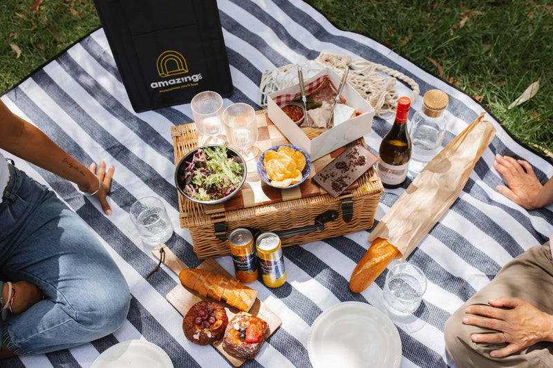 picnic-spread-on-blue-and-white-blanket