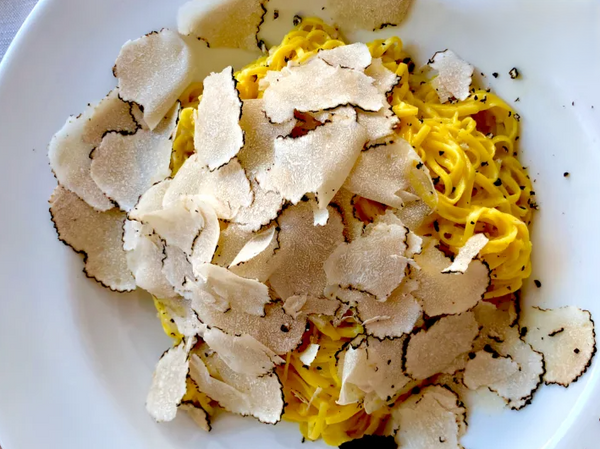 Chef adding cheese to plate.jpg