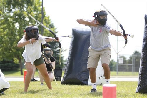 playing archery tag