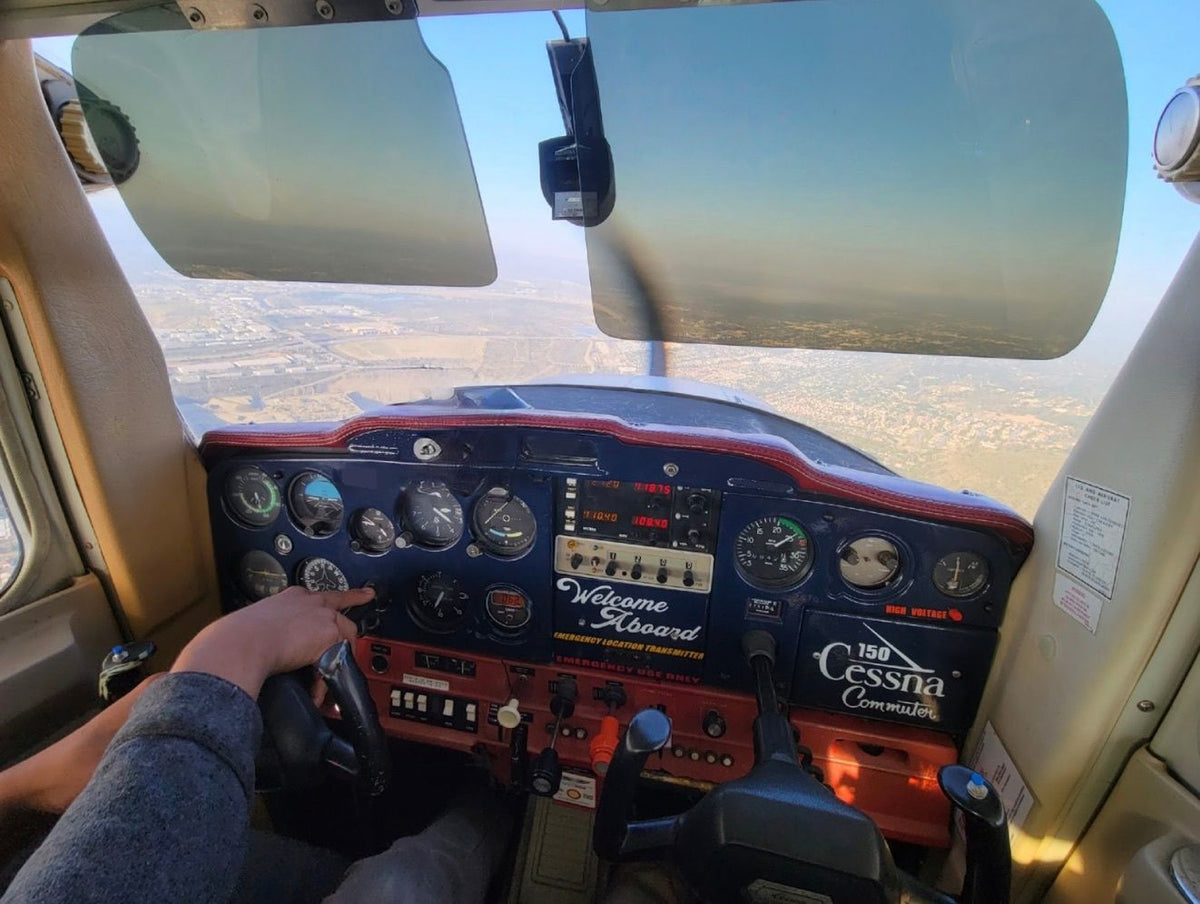 pointing-to-controls-in-the-cockpit
