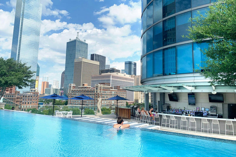 pool-day-pass-omni-dallas-hotel-infinity-pool-bar-skyline-hero.jpg
