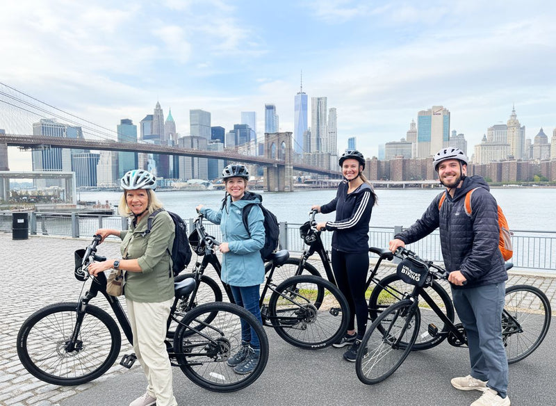 posing with brooklyn bridge and bikes