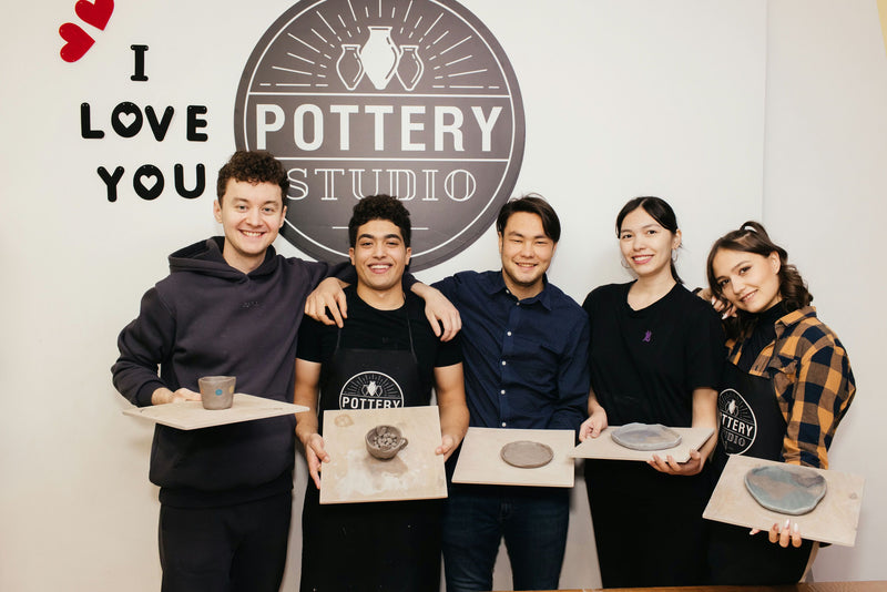 pottery group with work