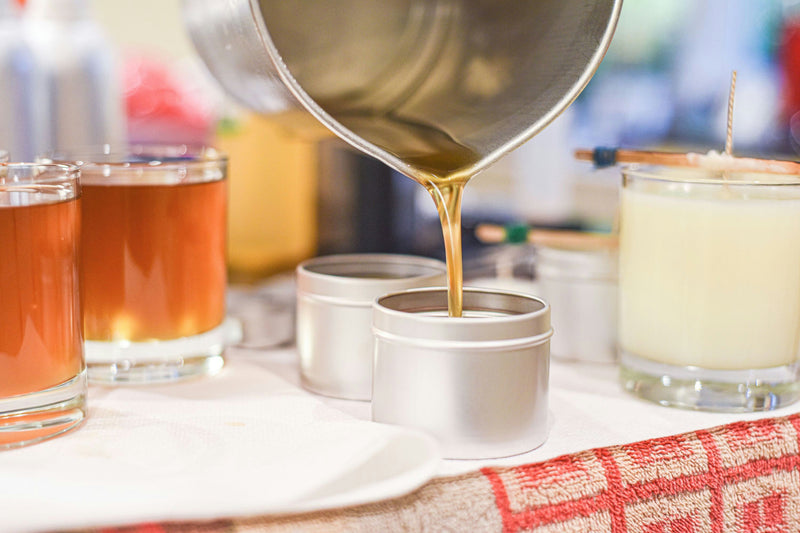 Pour wax into candle