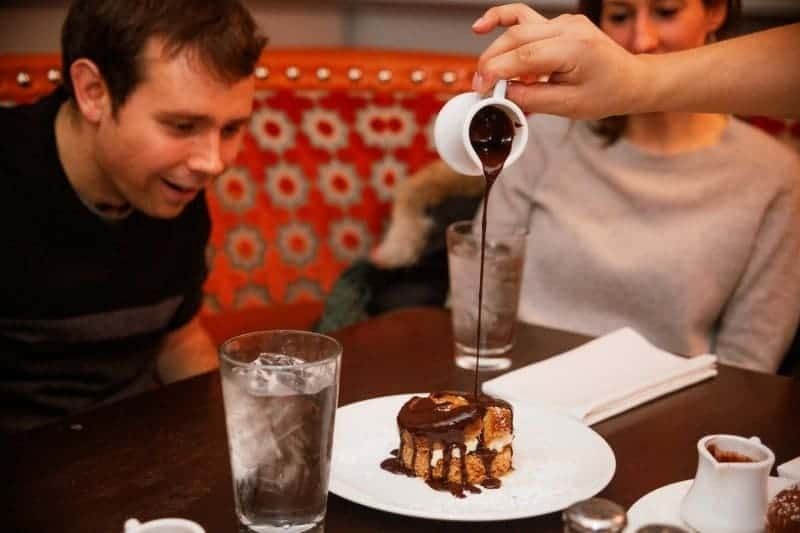 pouring-chocolate-over-dessert