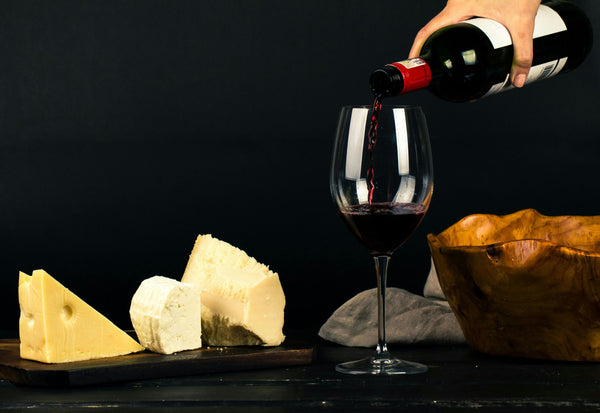 pouring wine into glass