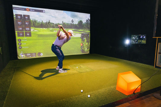 practicing with golf simulation
