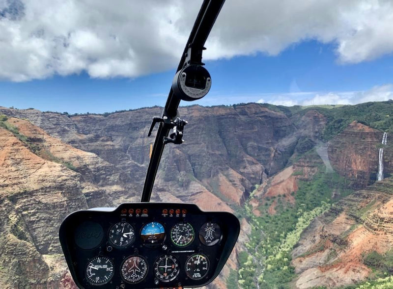 private-kauai-helicopter-tour-flying-above-rocks-jpeg