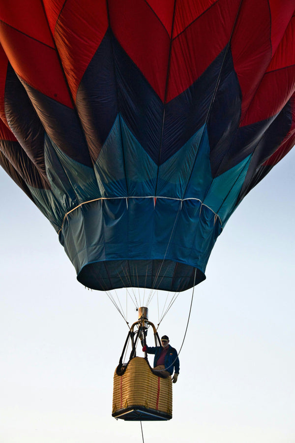 Red balloon in basket