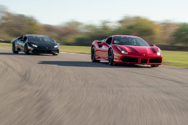 red car beating black