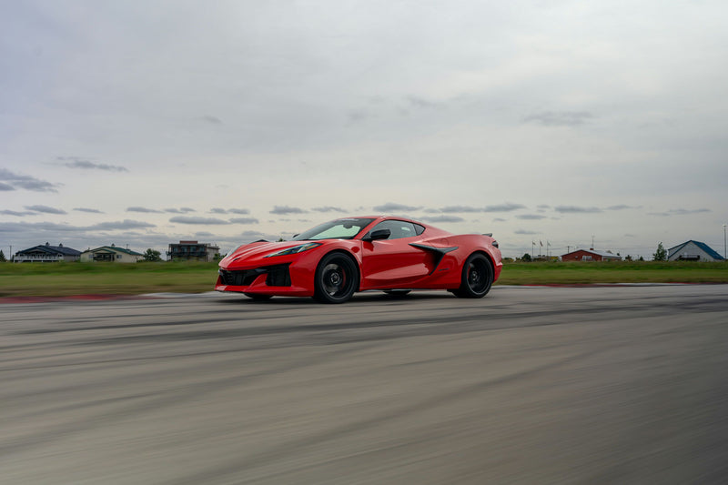 red-corvette-driving