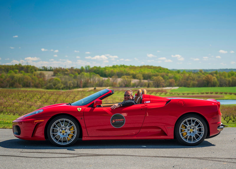 Red super car in country