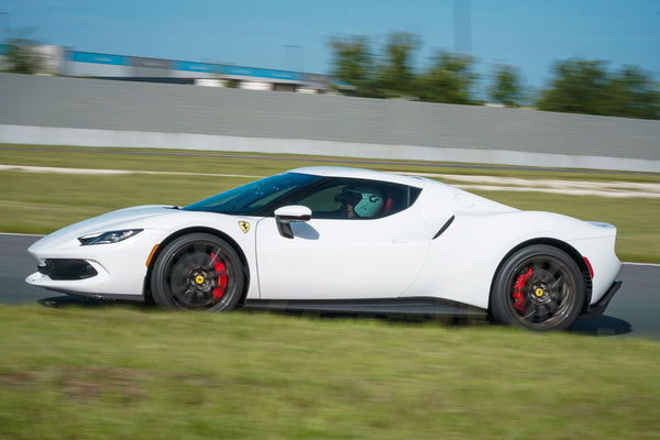riding in white ferrari