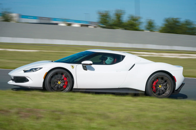 riding in white ferrari