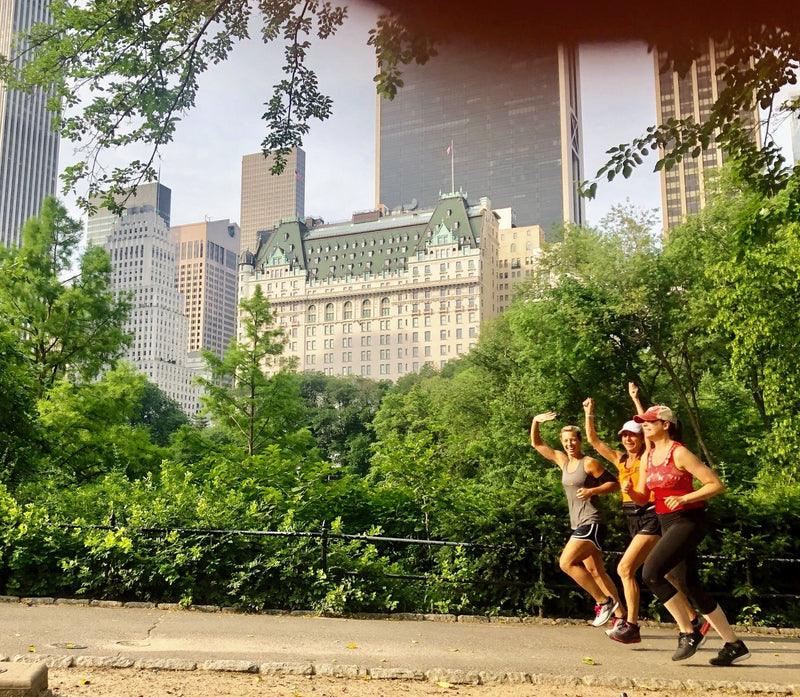 runners waving in new york city.JPG