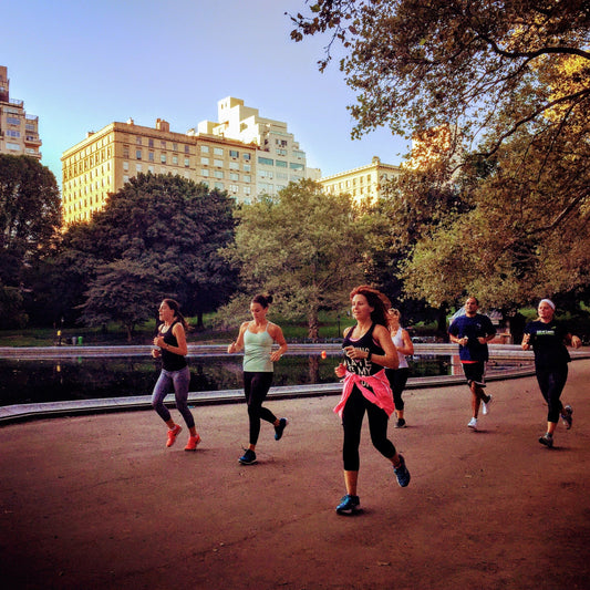 runners waving in new york city.JPG
