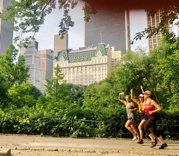 runners waving in new york city.JPG