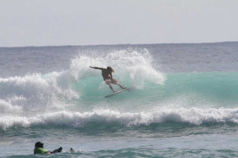 Sean red shorts surfing.JPG