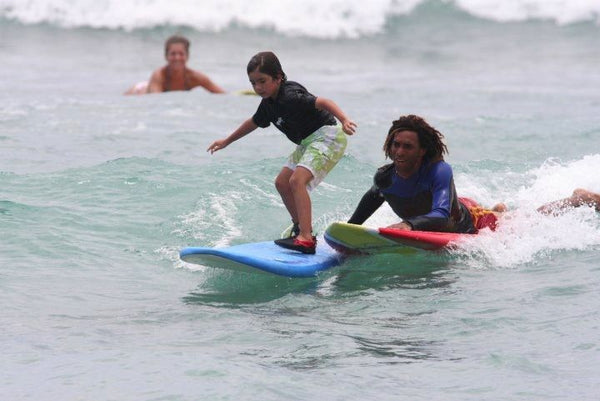 group of happy surfers hawaii.jpg