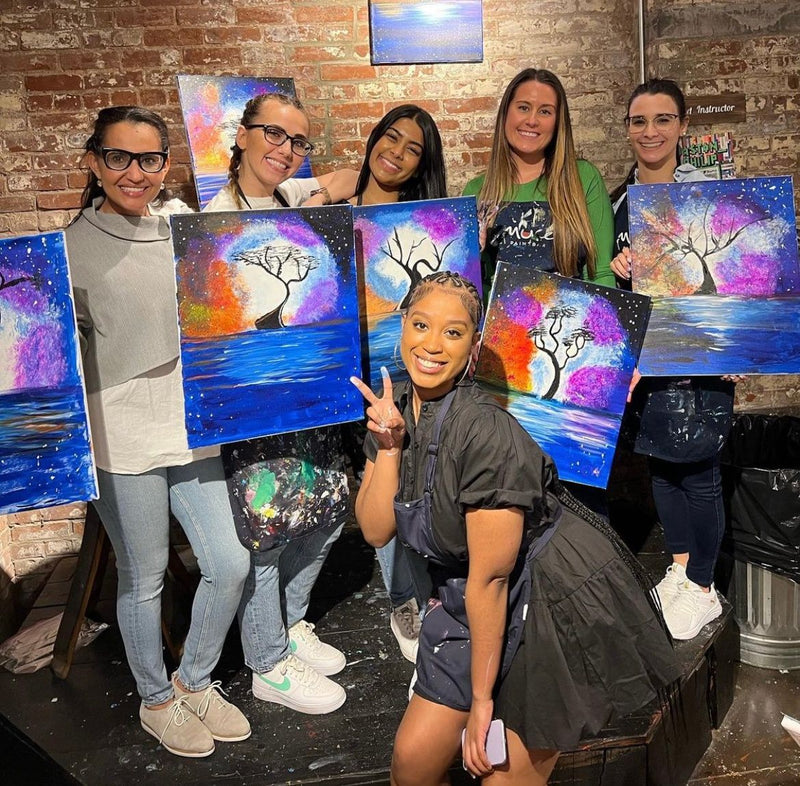 six-women-with-paintings-of-tree