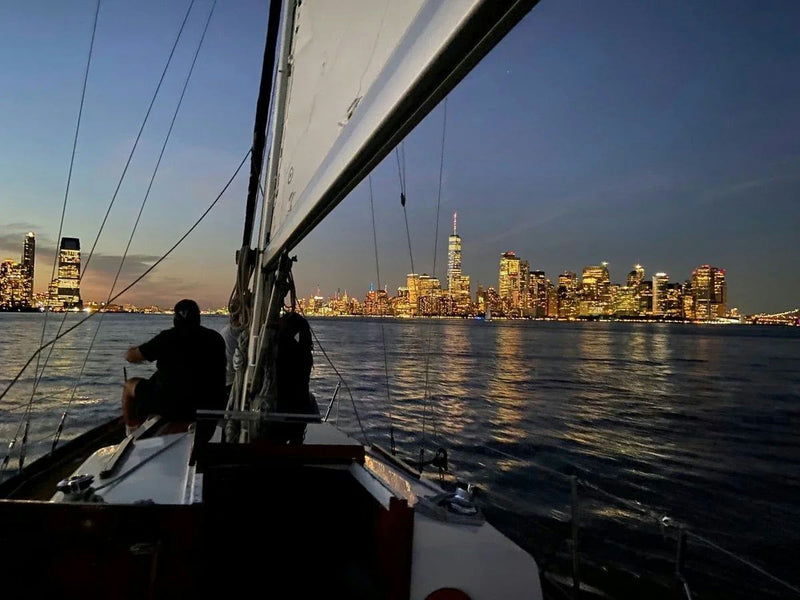 skyline and boat at night