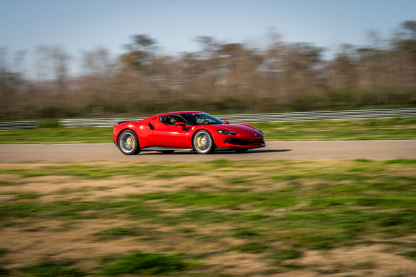 Sleek Ferrari 296 GTB Cornering on Raceway