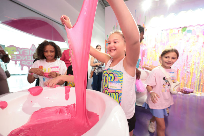 sloomoo-institute-washington-dc-guests-playing-with-slime.jpg