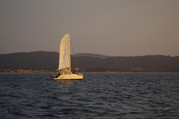 sunset-catamaran-sailing-cruise-distance-shot-jpeg