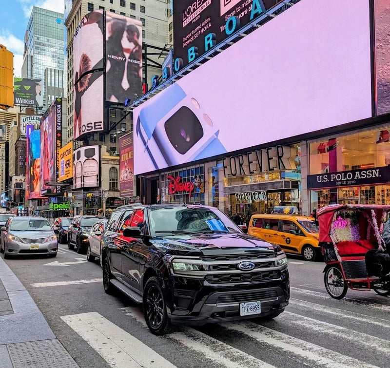 SUV driving times square