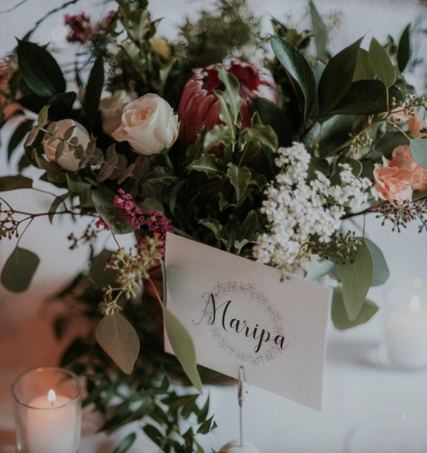woman making a floral arrangement