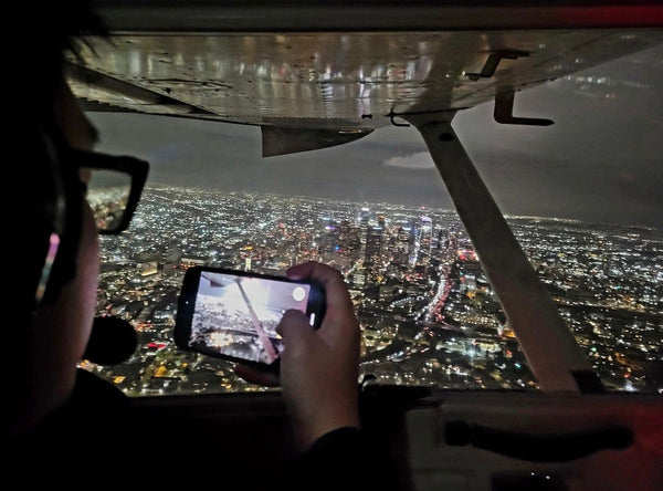 taking-a-photo-of-city-at-night