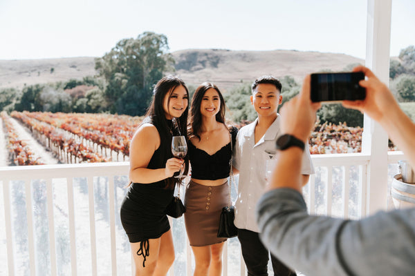 taking-a-photo-of-group-at-winery
