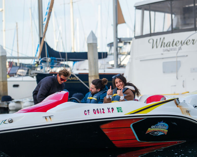 thumbs-up-in-speed-boat