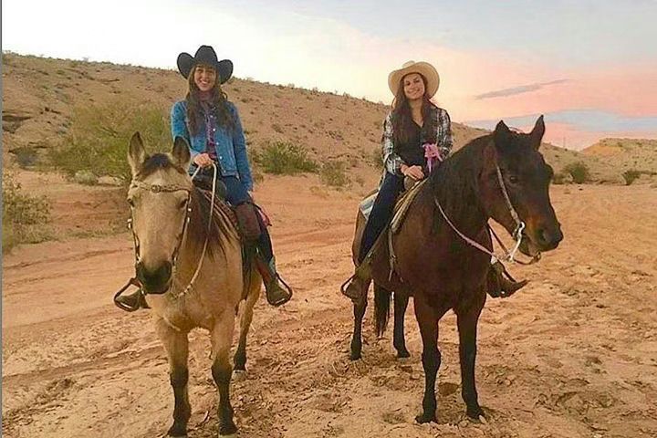 two-horseback-riders