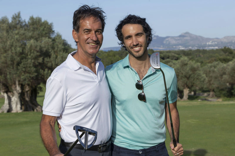 two-men-with-golf-clubs