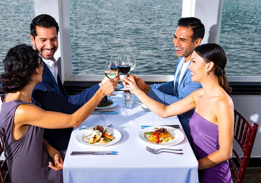 two couples on signature lunch cruise in nj toasting