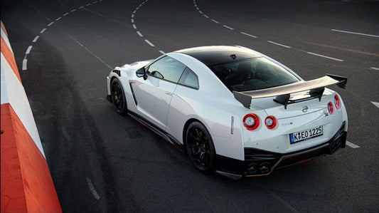 white Nissan GT-R NISMO on road