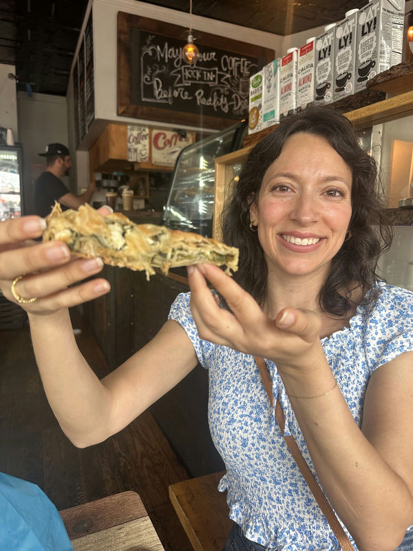 woman holding quiche